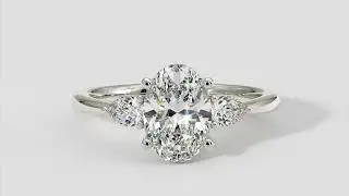 Oval Shape Diamond Ring With Pear Shape Side Diamonds In 18k White Gold &ndash; Australian Diamond Network