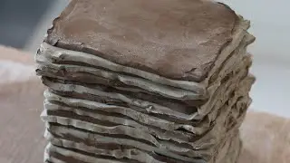 Lifting a layered nerikomi clay block, to prepare for making ceramic bowls #shorts