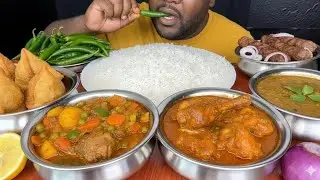 Eating Chicken Curry, Vegetable Curry and White Rice With Green Chilies