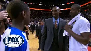 Kobe Bryant and Dwyane Wade chat with Wade's son following Lakers loss in Miami