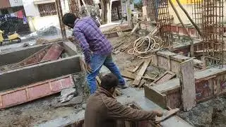 Removal of centring sheets from plinth beam 