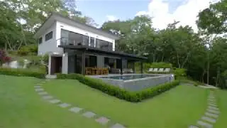 Tropical landscape and infinity lap pool - Out of Office Villa