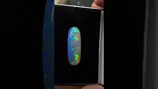 Long Opal full of fire flash. 29.8 carats. 40 x 14 x 9 mm. Ethiopia. Make a excellent pendant.