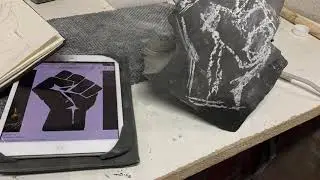 How to Stone Carve a Raised Fist in Black Marble