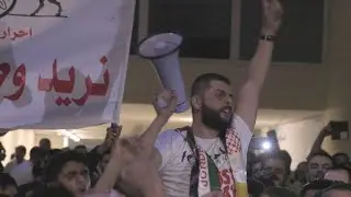 Protesters defiant as Jordanians strike over tax bill