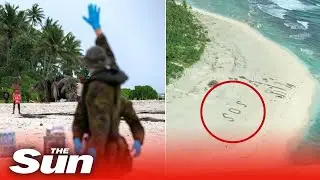 Huge SOS sign marked in sand saves men stranded on tiny Pacific island