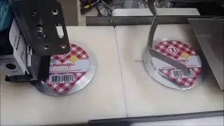 Принтер с технологией печати Hewlett Packard TIJ2.5 в автомате фасовки плавленого сыра.