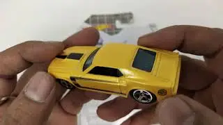 HotWheels '69 Ford Mustang - Yellow : HW 2019 - Larry Wood 50 Years of Design 04/10