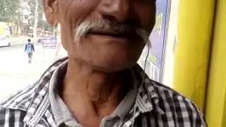 Desi Old man speaking english.