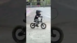 2 year old riding Juvenile Cult Pedal BMX Bike