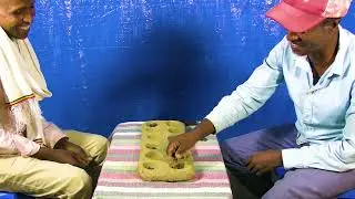 #ethiopia #ባህላዊ የኢትዮጵያ ጨዋታ ገበጣ(ላም ወለድ) የአውራ አምባ ልጆች በቤታቸው awra amba community #copywritefree HD