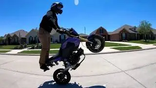 mini bike riding in the neighborhood