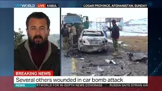 Afghan Taliban kill at least 12 in car bomb attack on military base