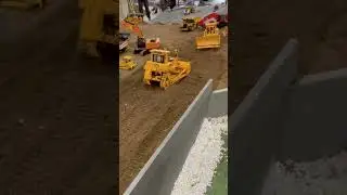 BIG $2500 dollar hydraulic RC bulldozer moving dirt at Cabin Fever Expo