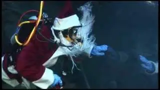 Underwater View of Diving Santa