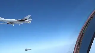 Russian MiG-31 escorting Tu-142MK
