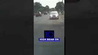 Illegally using high beam headlights