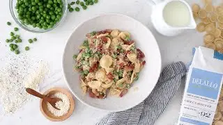 DeLallo Orecchiette with Peas Pancetta and Cream