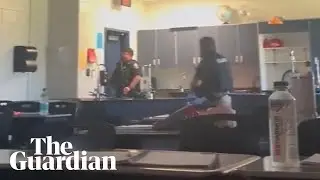 Georgia: footage shows students hiding in classroom as shooter enters campus