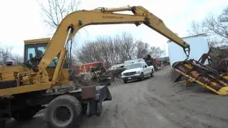 Cat 214 Mobile Excavator