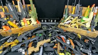 Two Giant Wooden Chests of Toy Rifles, Sniper Rifles, Bead Throwers, and Revolver Capsule Detonators