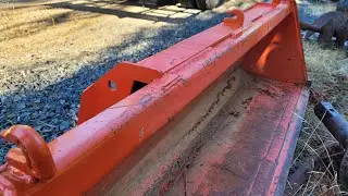 Welding chain hooks to a Kubota bucket something different