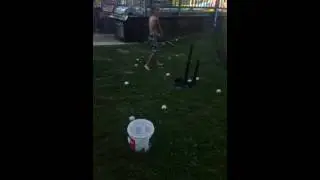 Hitting a water balloon with a baseball bat in slow-mo