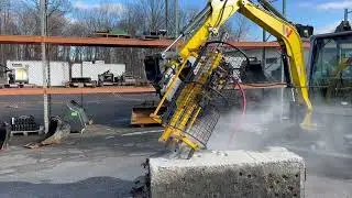 EZ Drill Mini Excavator Mounted. AbleTool & Equip., for predrilling Darda splitter holes and other a