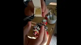papercube: The LEGO Mindstorms based production line and the result of the folding mechanism