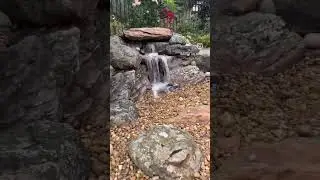 beautiful pondless waterfall built into this existing slope.#waterfall #pondless #outdoorliving