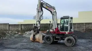 ‘10 Takeuchi TB175W Driving