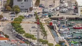 Aerial view of marina and city center timelapse in Setubal, Portugal.