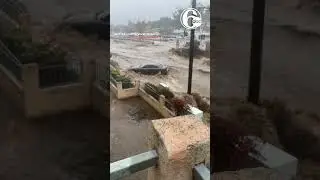 Vehicles carried away by floodwaters in San Diego, California