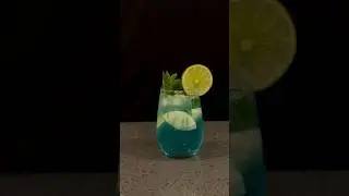 Blue Mint Lemon Splash 🩵🧊 #CocktailRecipe #VodkaDrink #BlueCocktai l#IceGlass #DrinkShorts