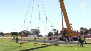 Drop in cricket wicket tray lift