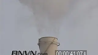 General B-Roll footage of smoke stacks at a power plant and clouds of pollution