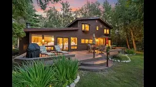 Burt Lake home with sand beach. 282 Plymouth Beach Drive, Indian River, MI 49749