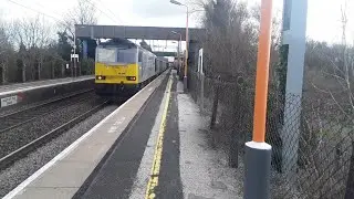 Trains and Planes at Marston Green. WCML. 25/02/2022.