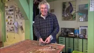 Restauratie van een glas in lood raampje.
