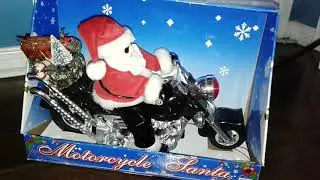 Animated Motorcycle Santa by: Action Novelty Corp