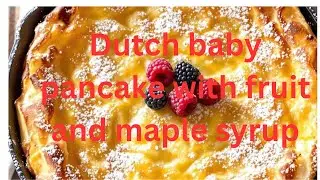 Dutch baby pancake with fruit and maple syrup