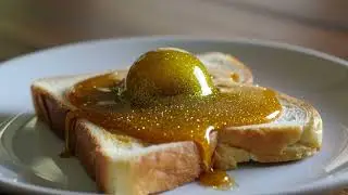 Ball of sun butter melting on toast. ASMR AI #asmr #aiasmr 