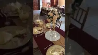 Burgundy and gold wedding ceremony and reception decor