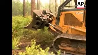 Fire crews are conducting controlled burns in Fargo, Ga in hopes of battling a massive wildfire.