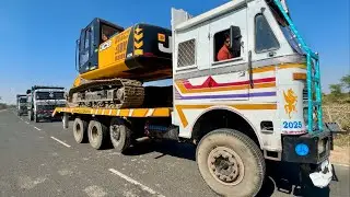 JCB 205 Excavator working with TATA 2518 Trippers Loading Mud TATA Truck 3118 Trailer