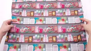 grey fabric with colorful candy and chocolate by Stof France