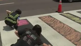 Protesters repaint Pride crosswalk honoring Pulse Nightclub shooting victims