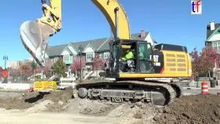 CATERPILLAR 349E L Digging On M-1 Rail Project, Detroit, MI, USA, 10/23/2014.