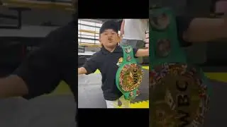 Hasbullah show off his WBC title belt.