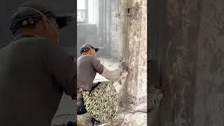 Cutting Concrete Wall Carefully Using Electric Angle Grinder Machine